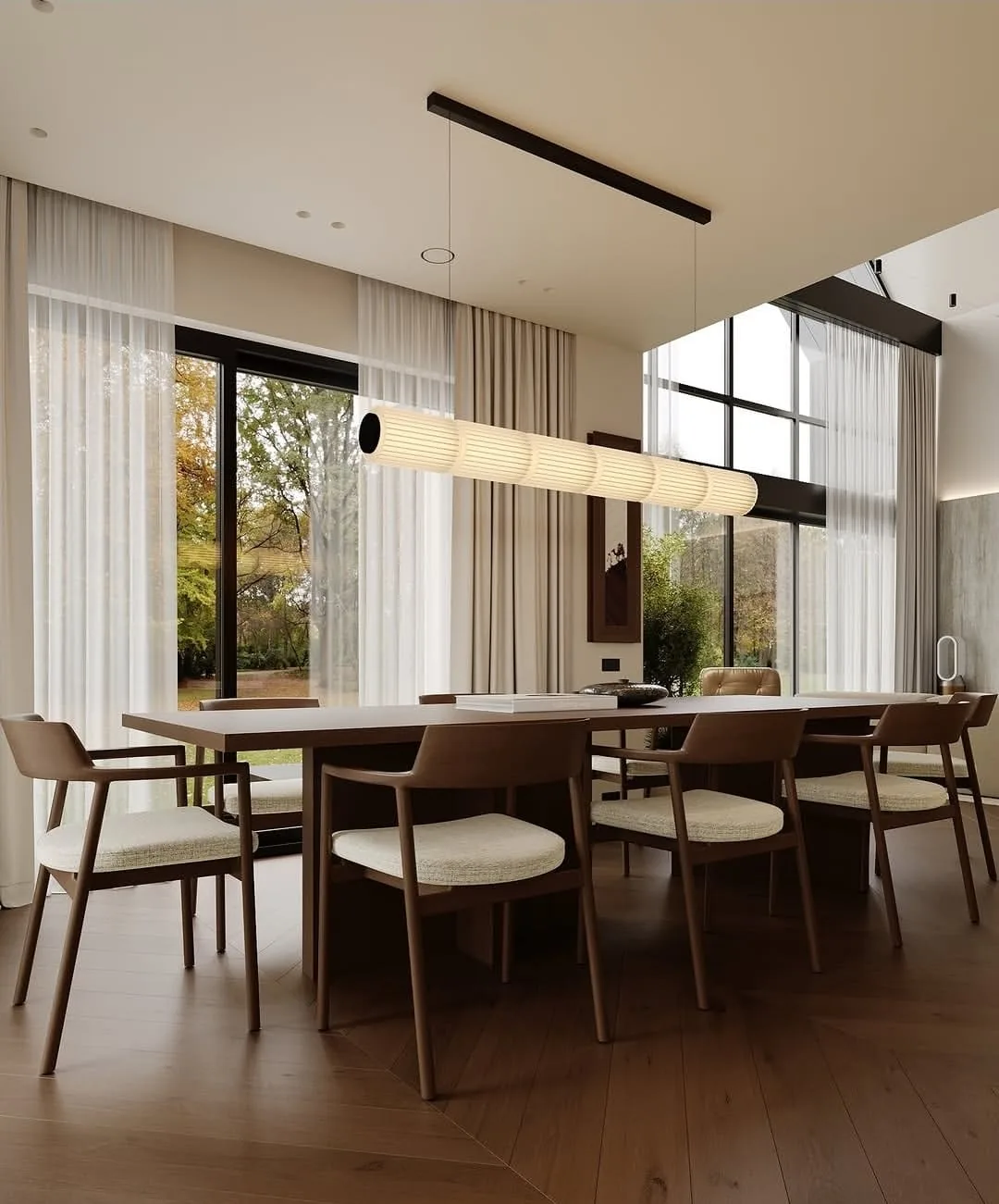 Vue 3D d'une salle à manger avec table en chêne, suspension linéaire et baies sur le jardin